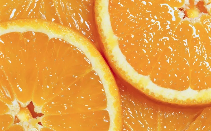 Năng lượng tràn đầy với background trái cây cam rực rỡ
