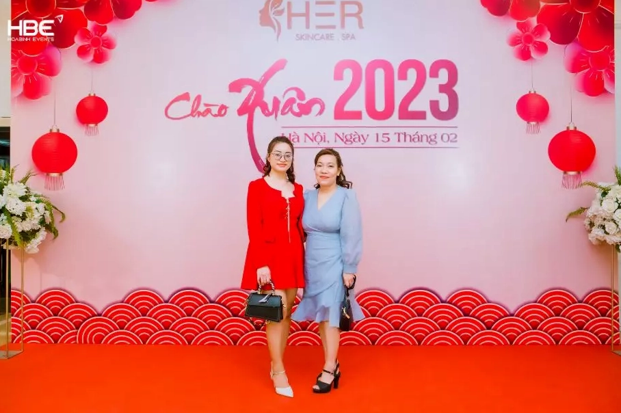 Hình ảnh phông nền tiệc cuối năm rực rỡ sắc xuân