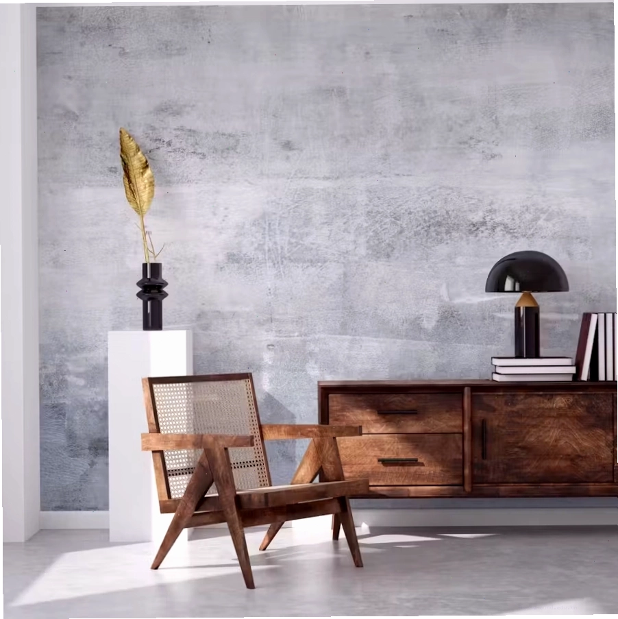 Smooth light grey concrete look wallpaper in a modern bedroom